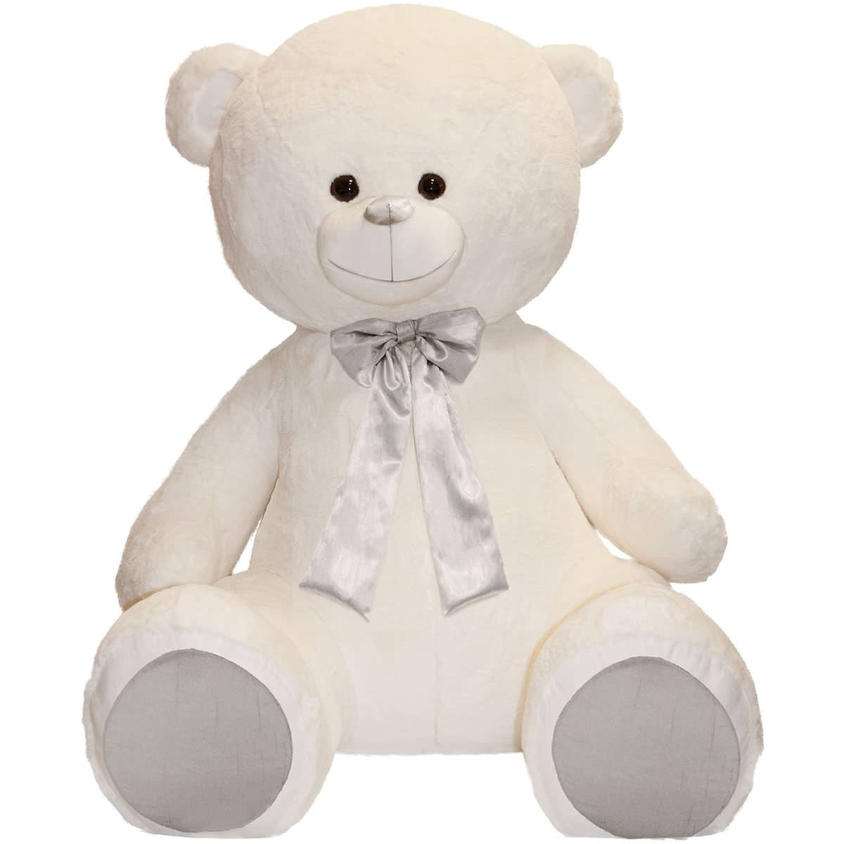 White teddy bear with a silver bow on a white background