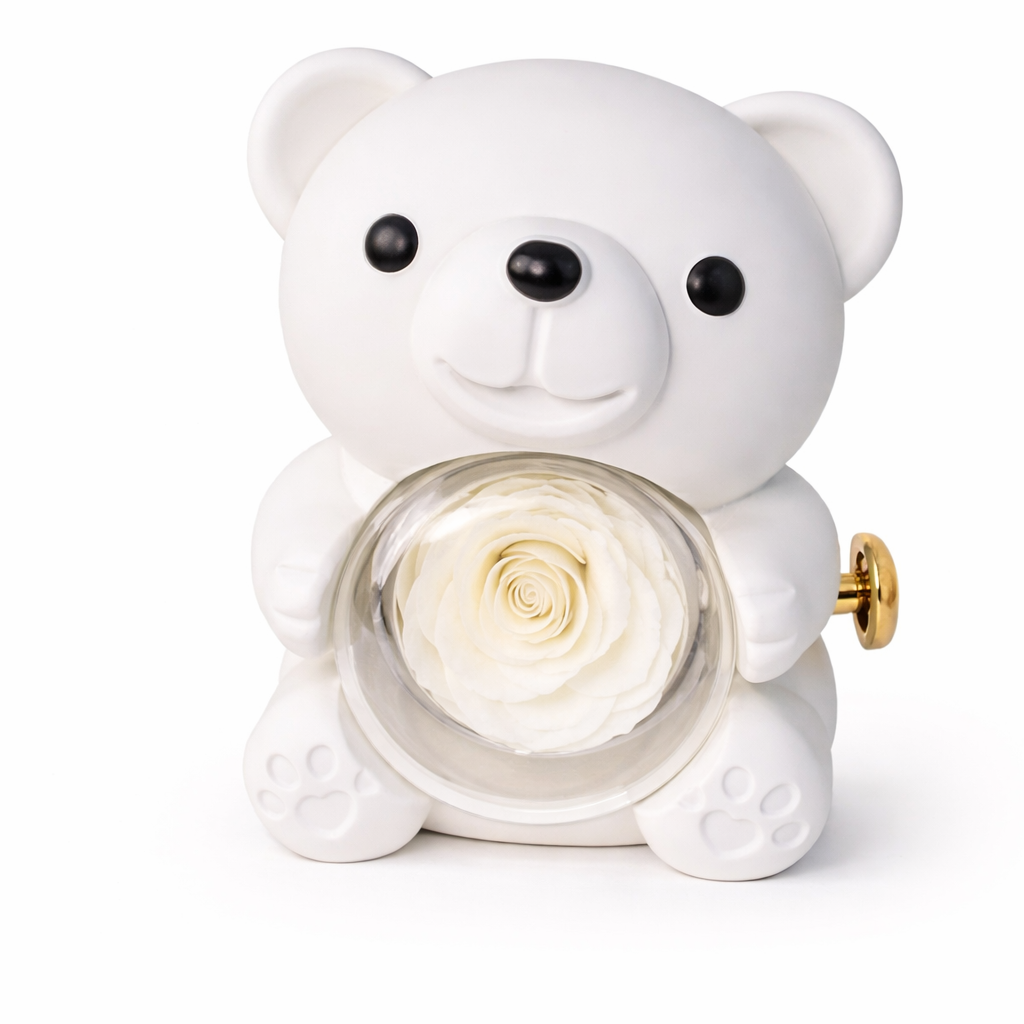 White teddy bear-shaped container with a rose inside on a white background