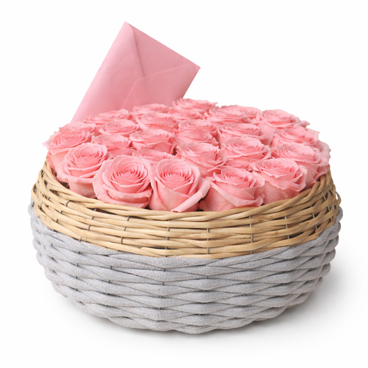 Basket of pink roses with a gray base on a white background